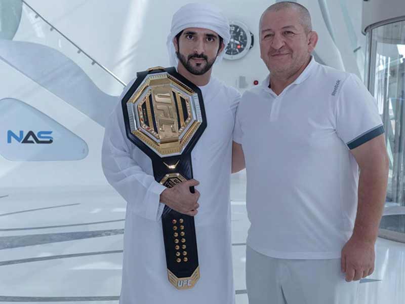ولي عهد دبي يستقبل المصارع العالمي محمدوف... شاهد الصور